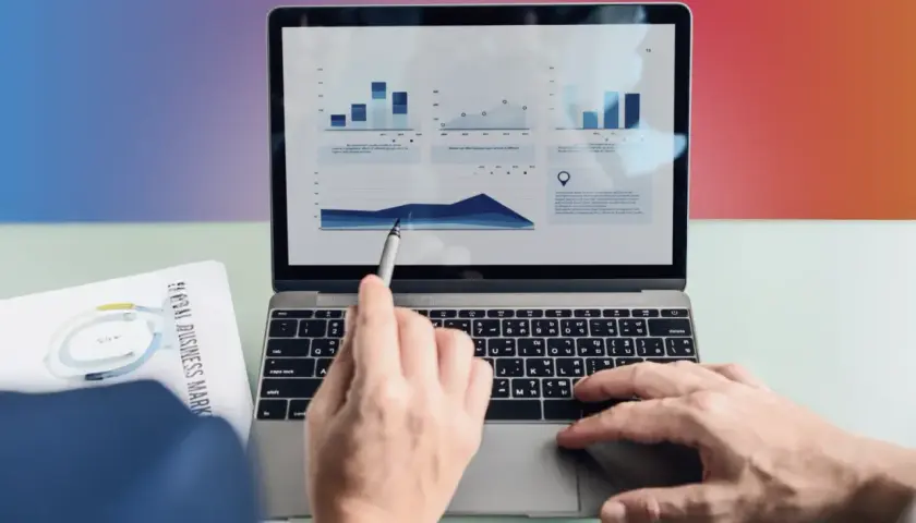 Analiza danych na laptopie. Ręka wskazuje na wykres, a obok leży dokument "Global Business Markets". To pokazuje, content co to znaczy w praktyce.