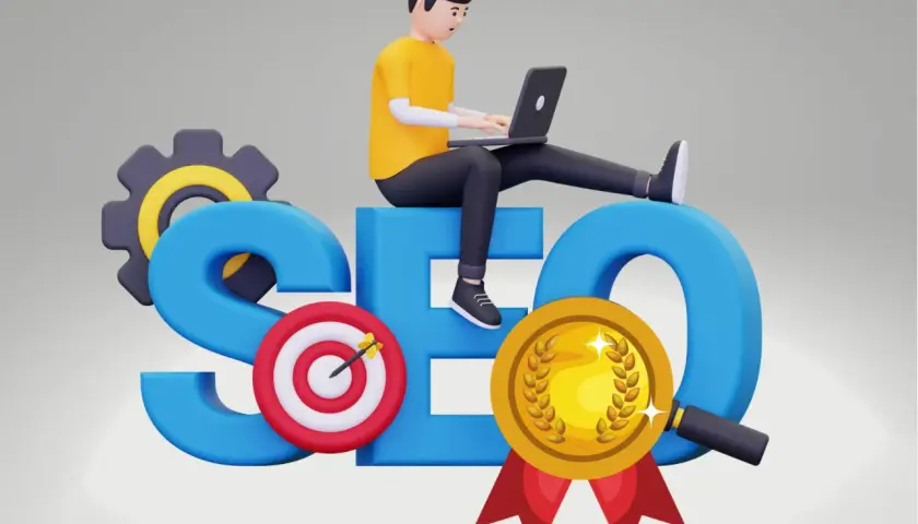 Chłopak na laptopie siedzi na literach SEO. Obok cel, medal i lupa. Jak nazwać domenę, by osiągnąć sukces?